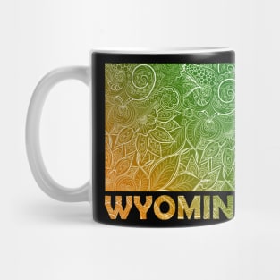 Colorful mandala art map of Wyoming with text in brown and orange Colorful mandala art map of Wyoming with text in green and orange Mug